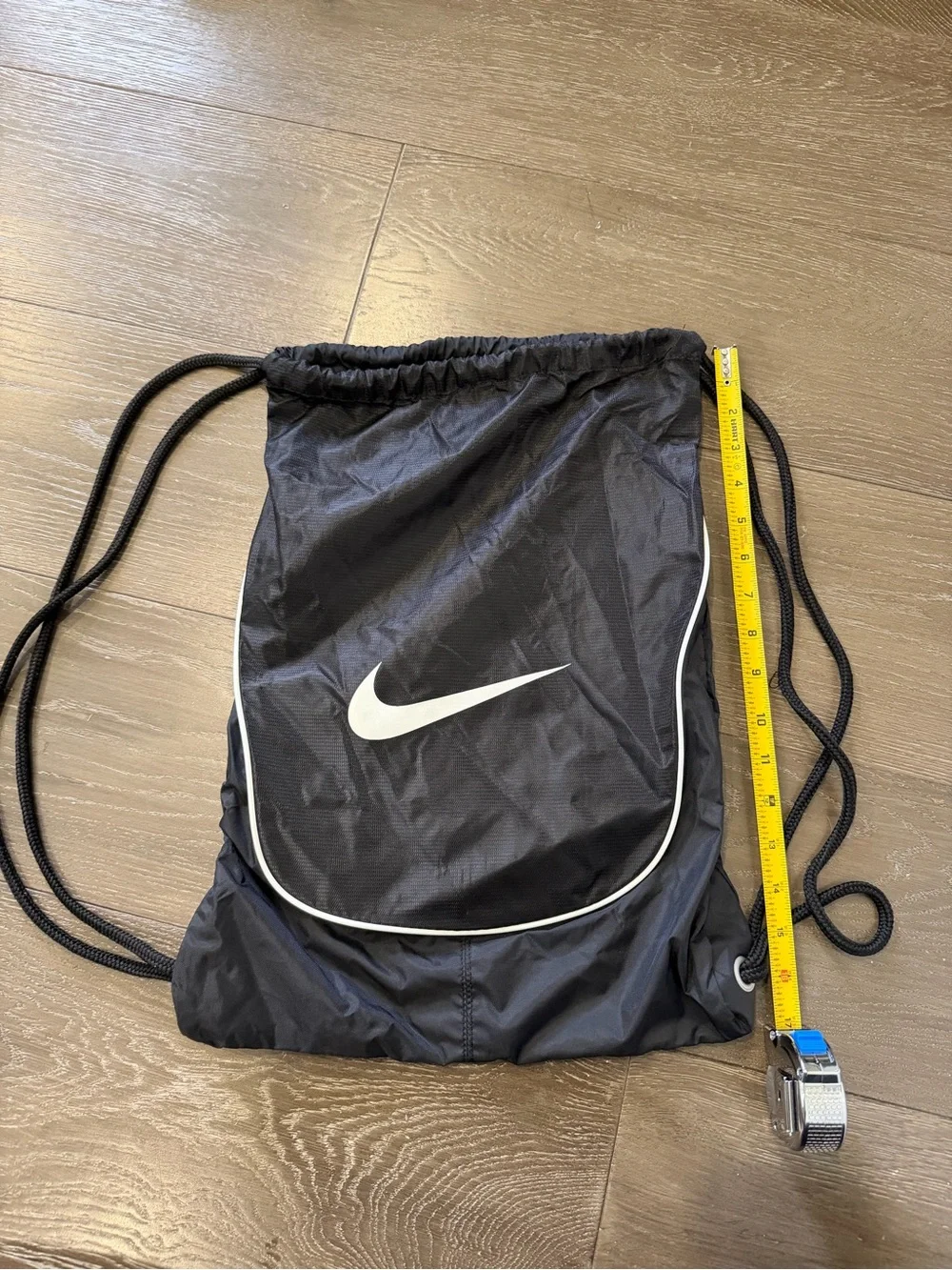 Nike Black Drawstring Backpack with White Swoosh